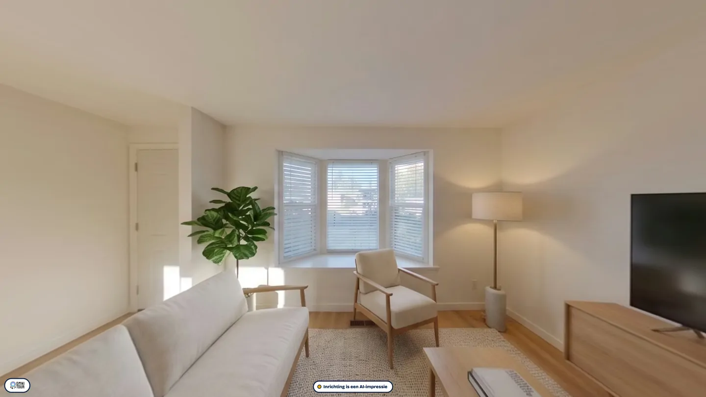 The living room furnished as ready to let.